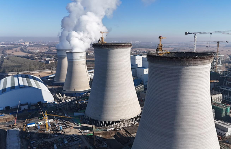 筑頂冰城暖源！國能哈熱二期項目3號排煙冷卻塔順利封頂